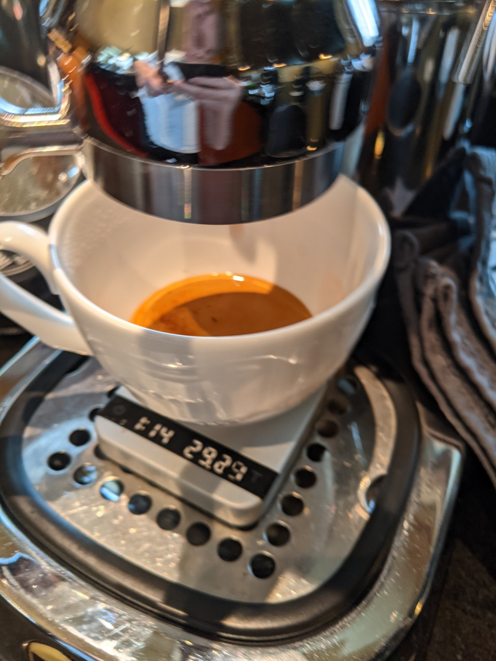 Espresso pouring into a cup