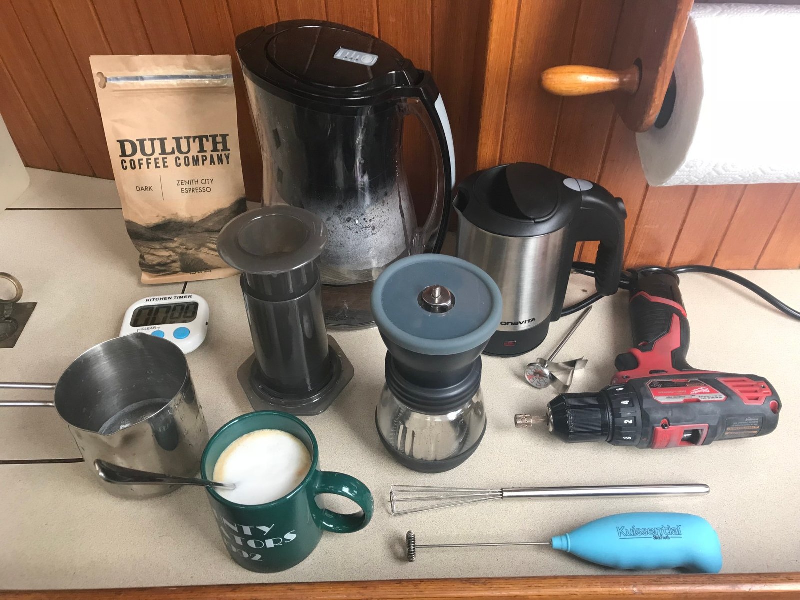 Coffee gear laid out for brewing on the boat